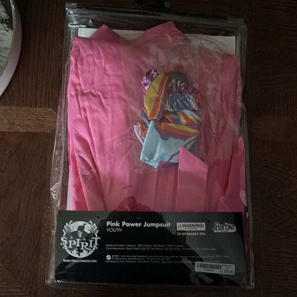 NWT  Spirit Halloween Barbie the Movie Kids Pink Power Jumpsuit size large 12-13